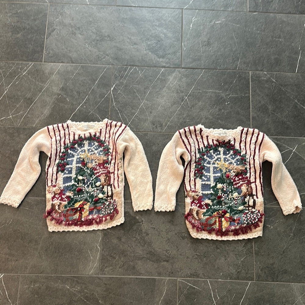 A pair of Vintage 90’s Casual Corner Cream and Red Festive Sweater